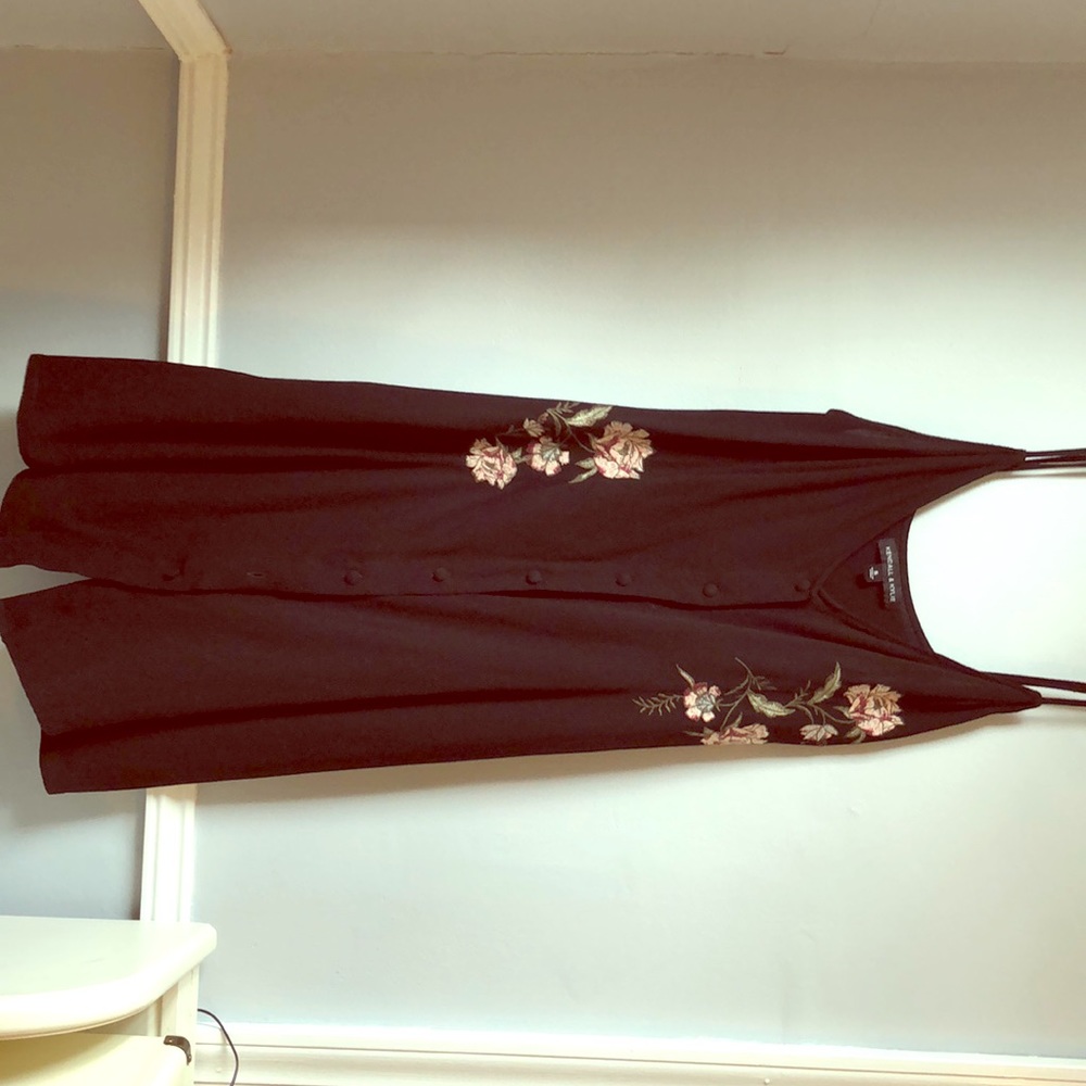 Black button down dress with floral embellishment